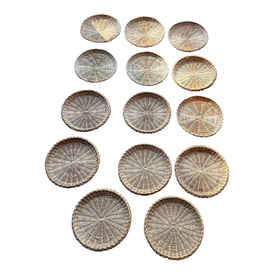 1970s Vintage Wicker Plate Holders- Set of 14: Up for consideration is a beautiful set of 14 wicker placemats. These would be great for a dinner party and are perfect for the interior design enthusiast! Please check out my other listings! 