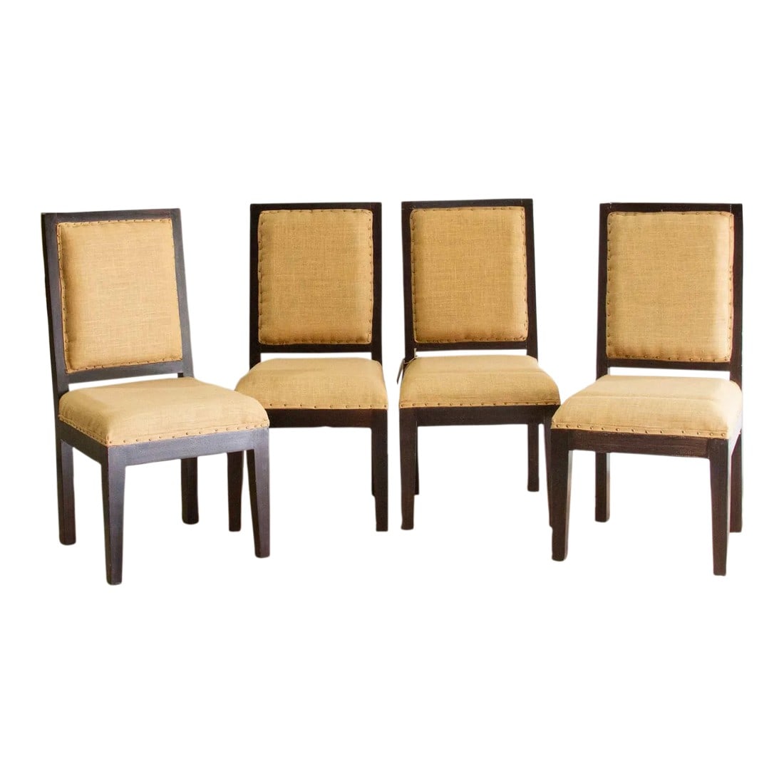 Set of Four Burlap Brown Dining Chairs: A set of 4 hardwood vintage dining chairs, featuring a tasteful combination of burlap upholstery and a rich dark brown finish. The timeless design of this vintage dining set is characterized by clean