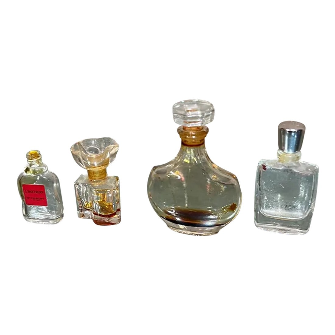 Vintage Paris Vanity Four Miniature Glass Perfume Bottles: AMBIANIC presents Paris Vintage Vanity Miniature Glass Perfume Bottles Set of four Vintage Vanity Glass Perfume Bottles Includes Oscar de la Renta Givenchy Lancome Paris Tallest 2.75, Smallest 1.75 Pr
