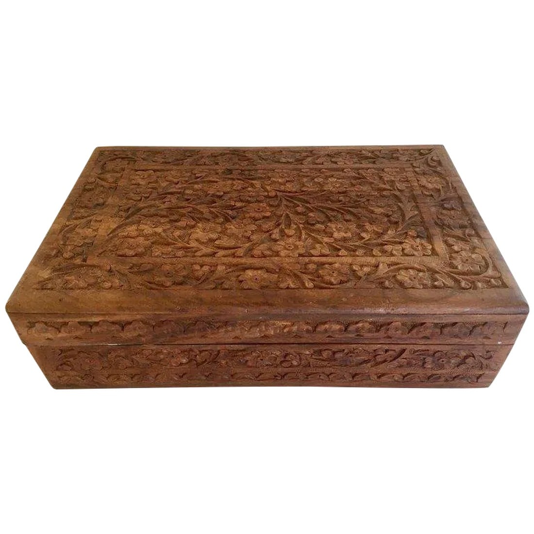 Early 20th Century Anglo Raj Hand-Carved Wooden Decorative Jewelry Box: Hand-carved large wooden Anglo-Raj jewelry box. Early 20th century wood box richly decorated overall with arabesques and floral carving. Hinged lid shallow relief carving with interior lined with blue