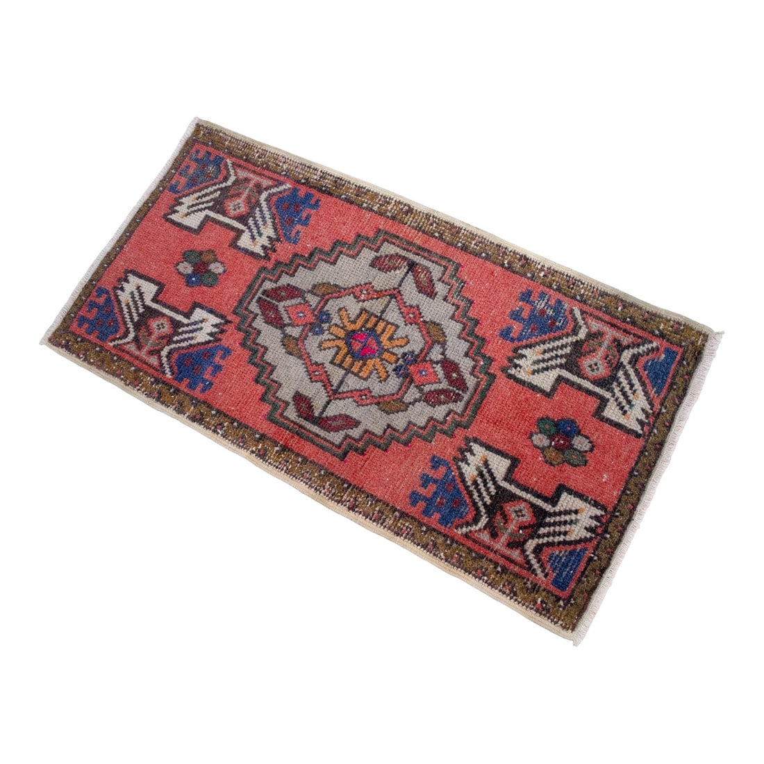 Distressed Low Pile Turkish Petite Rug Hand Knotted Faded Mat Enrty Decor- 1'8'' X 3': This charming vintage piece features a soft terracotta palette with indigo and cream accents, embodying the warm, rustic aesthetic of Central Anatolia. Its compact size and low, shaved pile make it a