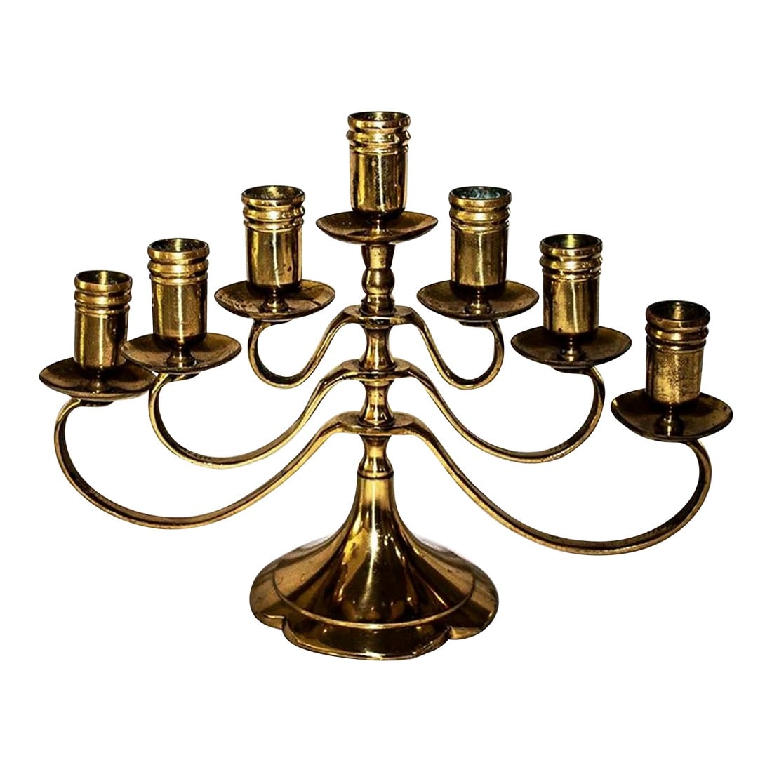 Antique Solid Brass Swing 7 Arm Menorah Candelabra Candle Holder: This antique solid brass swing arm Menorah candelabra holds 7 candles. It belongs to a friend who is 70 years old. This was belonged to her uncle who brought it to New York from Russia as a young