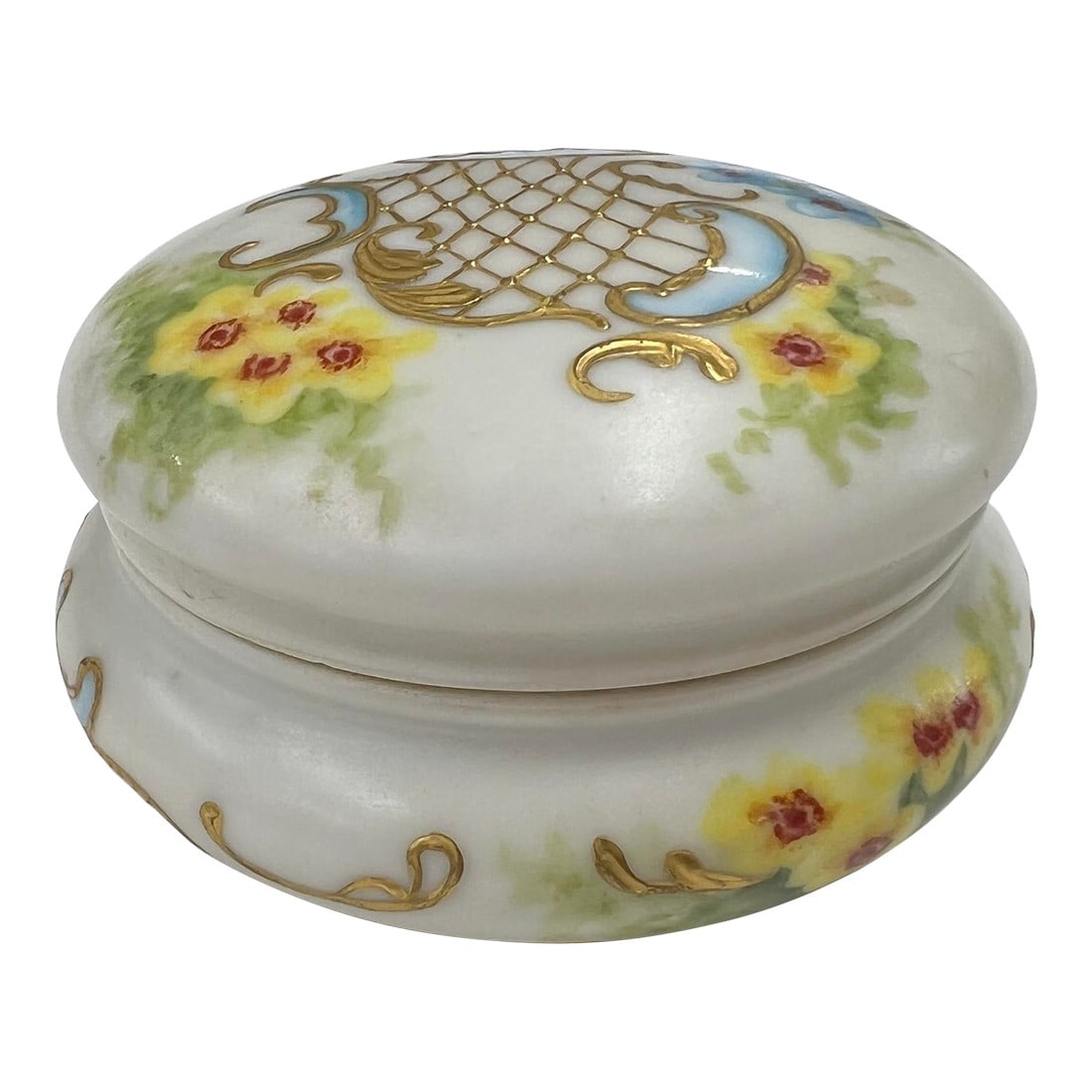 French Trinket Box With Floral Design and Gold Leaf Highlights: French trinket box with floral design and gold highlights. Great bookshelf or tabletop item. Keep those small items out of sight. Measures 3.5" diameter x 2" h. Marked T & V France Condition: Alterati