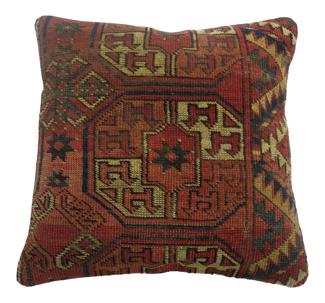 Mid 19th Century Turkeman Rug Pillow: Pillow made from a 19th century tribal Turkeman rug. Zipper closure and foam insert provided. Condition: Alterations: Unknown Imperfections: Some Imperfections Condition Notes: Because of the