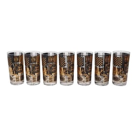 Set of Seven Chic Hollywood Regency Mid Century Georges Briard Black and Gold Highball Glasses