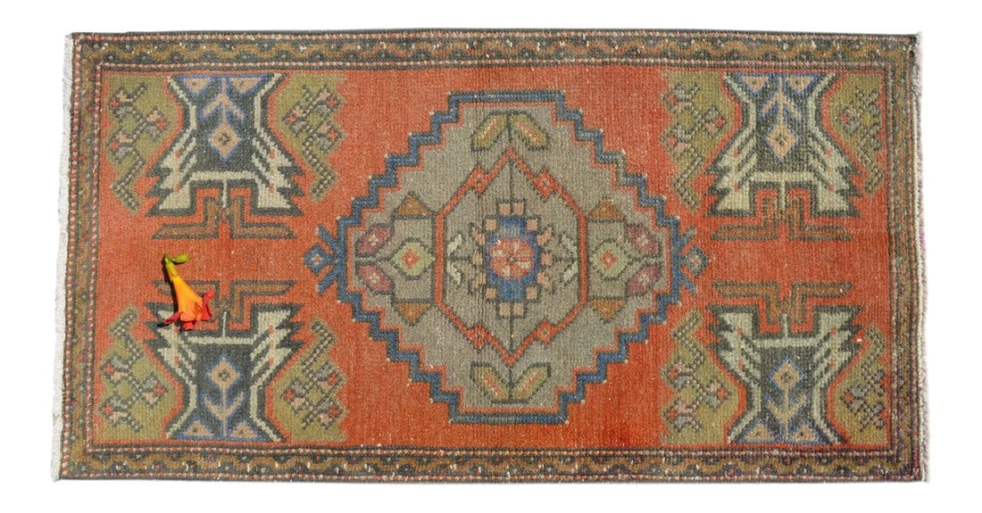 Distressed Low Pile Turkish Yastik Petite Rug Hand Knotted Faded Mat - 20'' X 39'': Vintage sorbus (vivid red-orange) background color yastik rug perfect for a small guest bath or in front of the kitchen sink Dimensions: 20" x 38.6" or 1'8"³ x 3'3" Material : Wool on cotton.