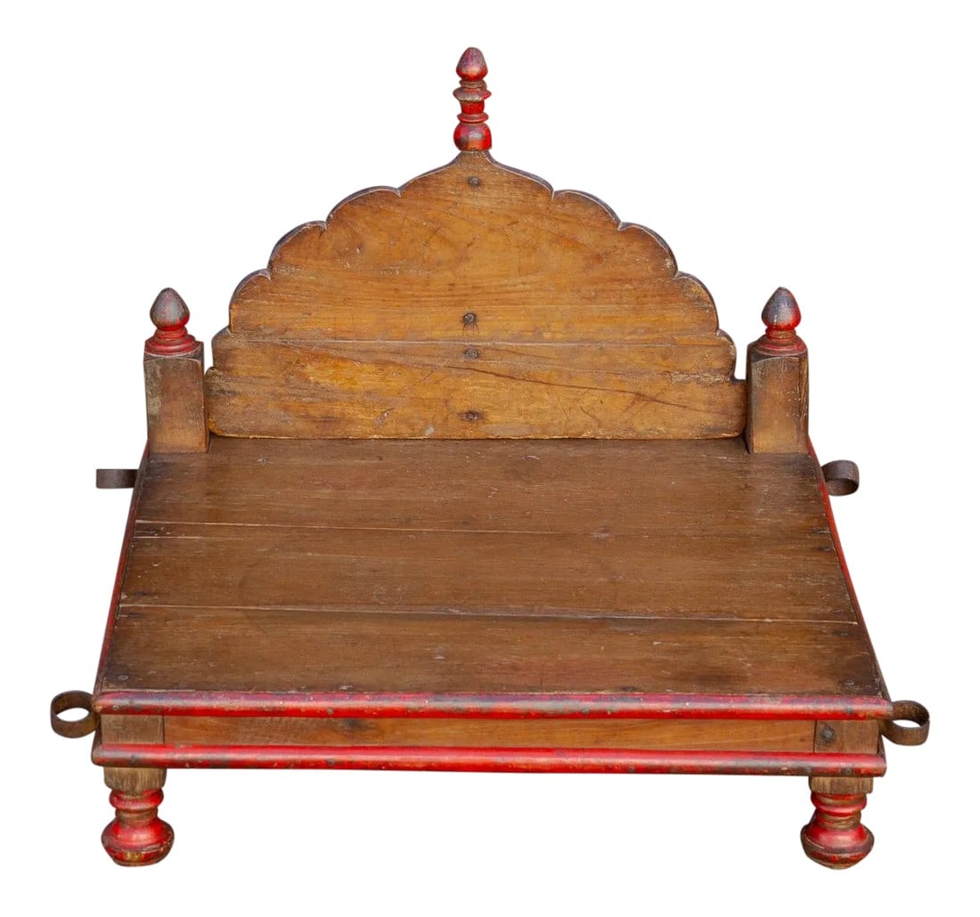 Antique Pidda Chair: Mid 20th century low teak Pidda chair with removable arched back and painted red moulding. The retains four iron hooks which were used to hang the chair as a swing. The backside is removable so this