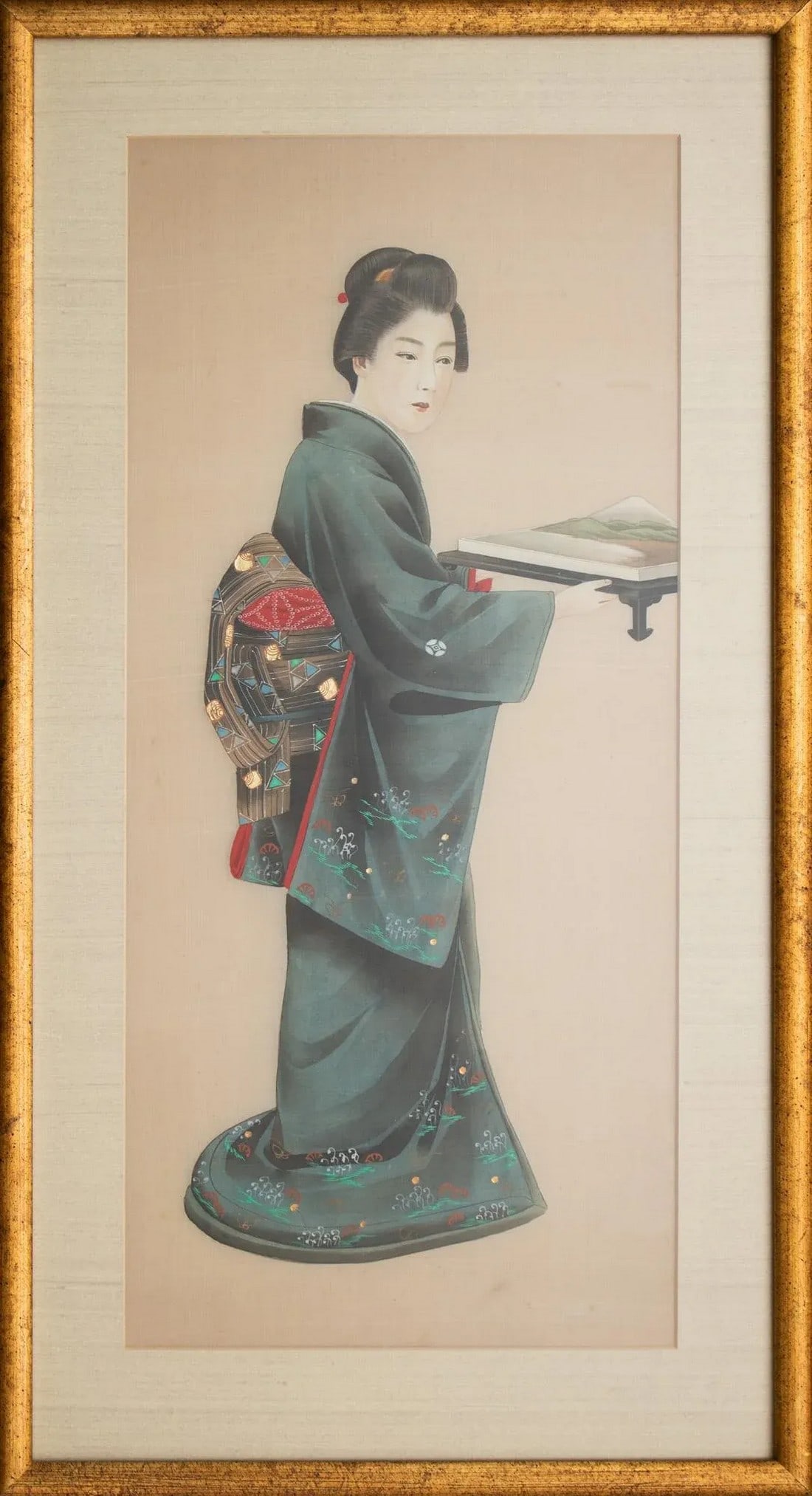 Early 20th Century Meiji to Early Showa Japanese Watercolor Painting of a Woman Carrying Mt Fuji on: Fine antique Japanese Watercolor painting of a Woman carrying Mt Fuji on a Tray. Her beautiful traditional kimono and obi are decorated with gold leaf. Signature of artist was left out during