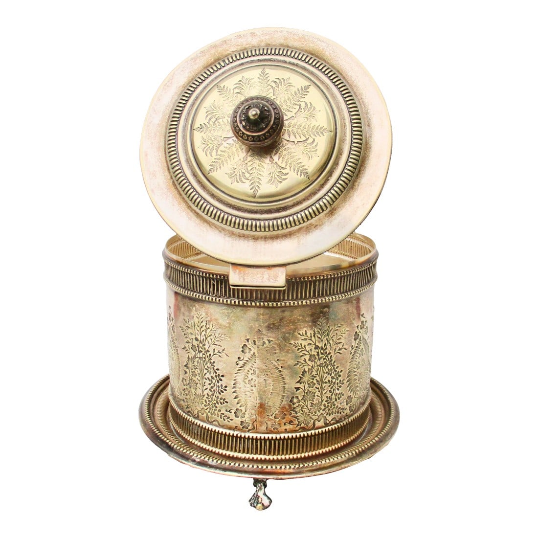 Silver Plate Biscuit Box Circa 1880s': Silver plate Arts and Crafts biscuit box with three paw feet. Fern and Ivy pattern around the outer walls. Hinged lid with extremely fine casting of beaded bands and ornamental finial on the lid. A