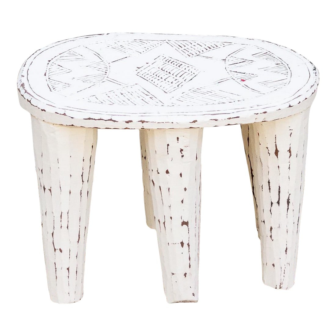 Stonewashed White Wooden Nupe Stool: A unique piece of African art, this vintage Nupe table from Nigeria is a must-have for collectors and enthusiasts of Nupe culture. Carved from a single log of wood and standing on 6 chunky tapered