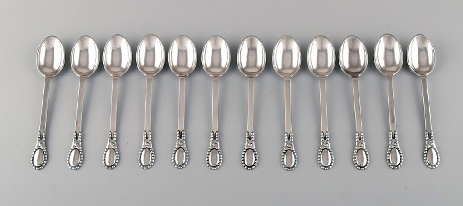 Evald Nielsen number 13. Twelve large teaspoons in hammered silver (830). 1920s. (1 of 4)