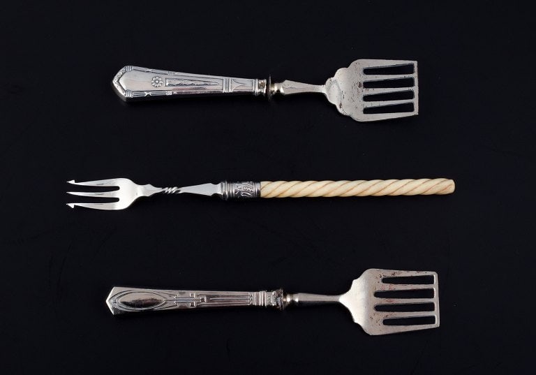A collection of older silver cutlery consisting of fruit knife, fish knife, two sardine forks and - 2