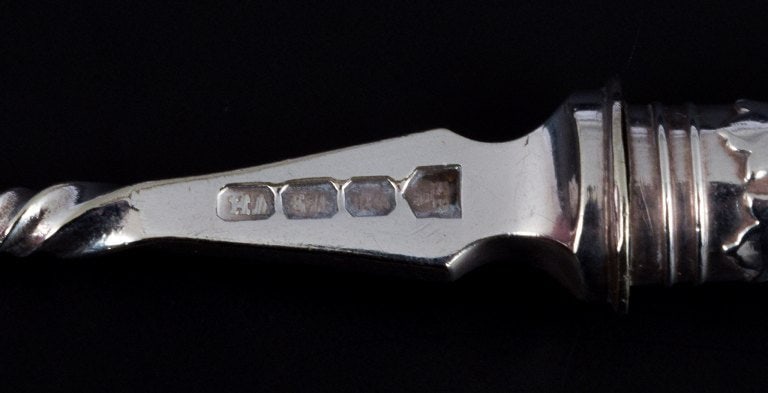 A collection of older silver cutlery consisting of fruit knife, fish knife, two sardine forks and - 4