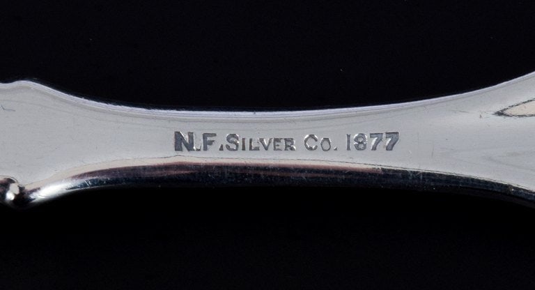 A collection of older silver cutlery consisting of fruit knife, fish knife, two sardine forks and - 5