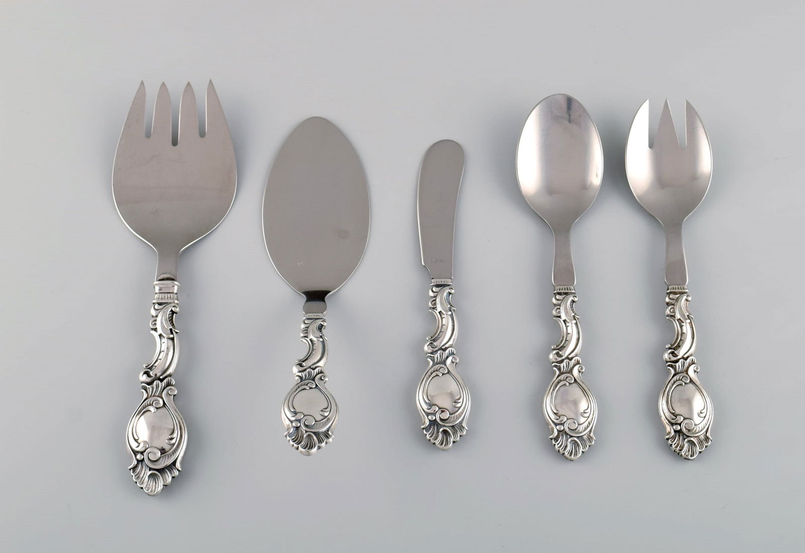 Danish silversmith. Five serving parts in silver (830). Rococo style, 1940s. (1 of 6)
