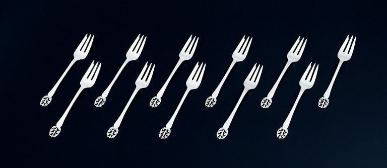 Danish silversmith, a set of eleven cake forks. Danish 830 silver.: Title:Danish silversmith, a set of eleven cake forks. Danish 830 silver. Description:Danish silversmith, a set of eleven cake forks. Danish 830 silver. 1930/40s. Perfect condition. Marked. Makers mark