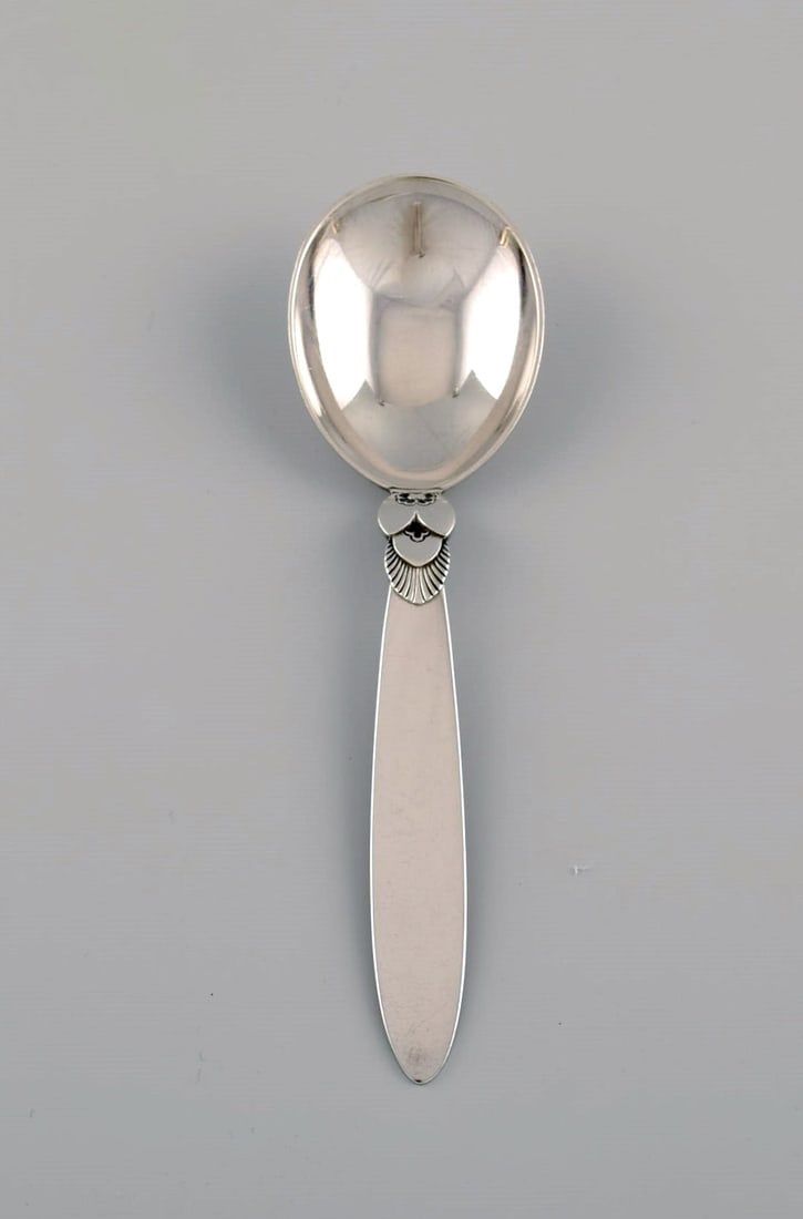 Georg Jensen Cactus jam spoon in sterling silver.: Title:Georg Jensen Cactus jam spoon in sterling silver. Description:Georg Jensen Cactus jam spoon in sterling silver. Length: 14 cm. In excellent condition. Stamped. Our skilled Georg Jensen silversmi