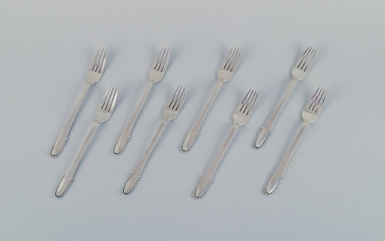 Georg Jensen Beaded. A set of eight lunch forks in 830 silver and sterling silver. - 2