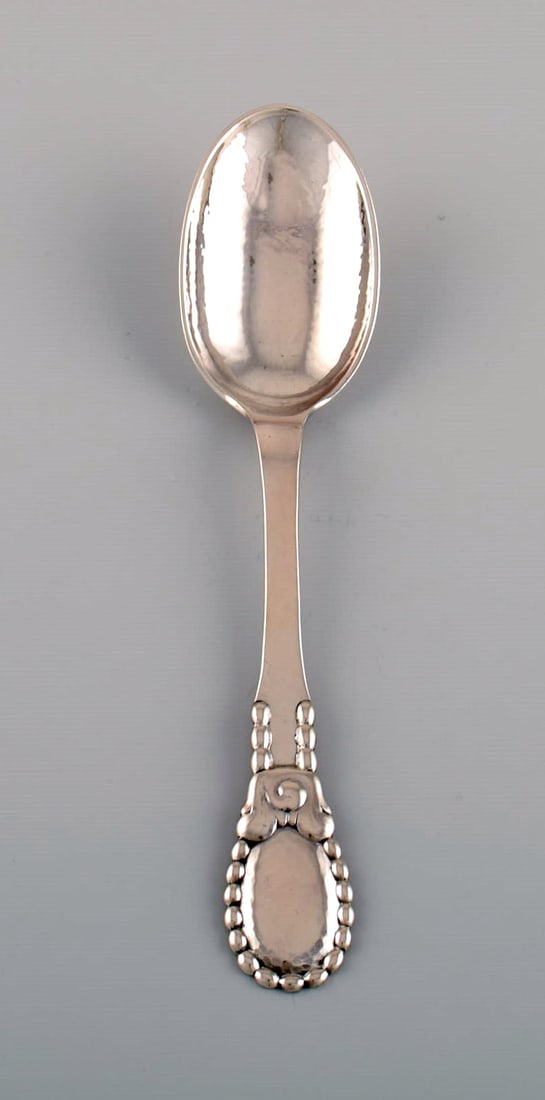 Evald Nielsen number 13 large tablespoon in hammered silver (830). 1920's. Six pieces in stock. (1 of 4)