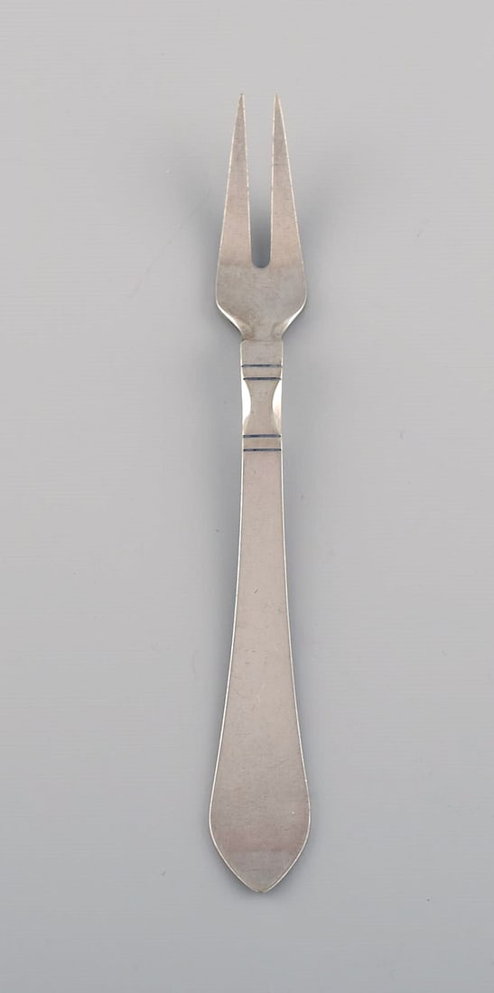 Georg Jensen Continental cold meat fork in sterling silver. Dated 1933-1944. (1 of 4)