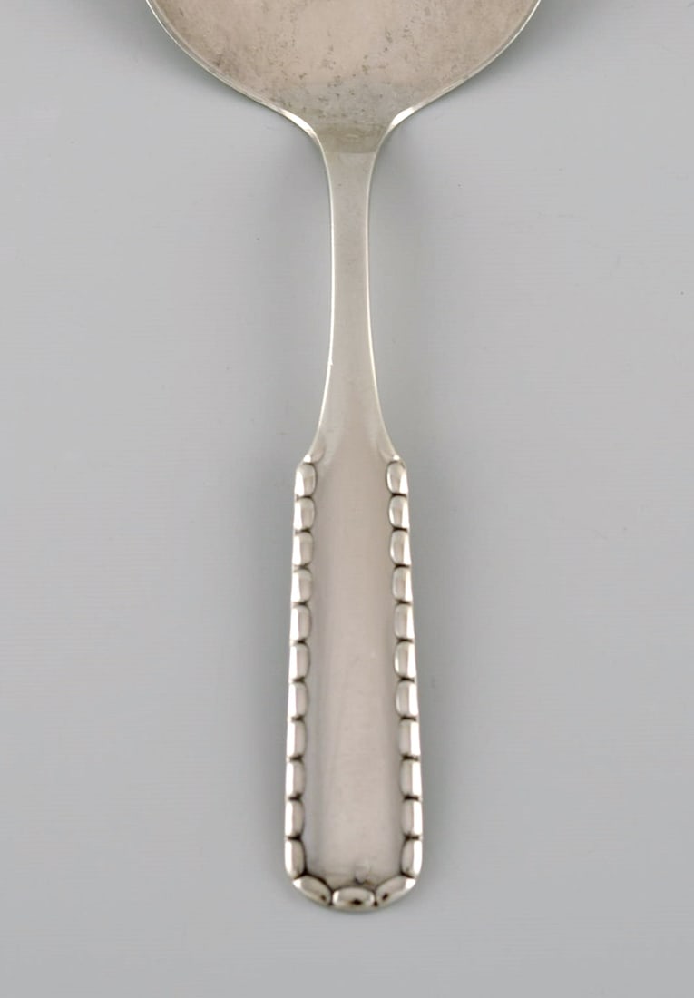 Early Georg Jensen Rope serving spade in silver (830). Dated 1915-1930. - 2