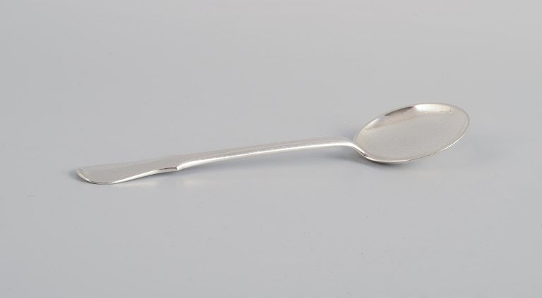 Evald Nielsen, Danish silversmith, two hammered sugar spoons in Danish 830 silver. One spoon model - 2