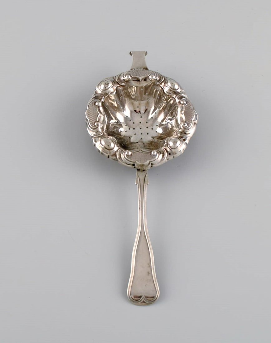 European silversmith. Antique silver tea strainer. Dated 1855 (1 of 5)