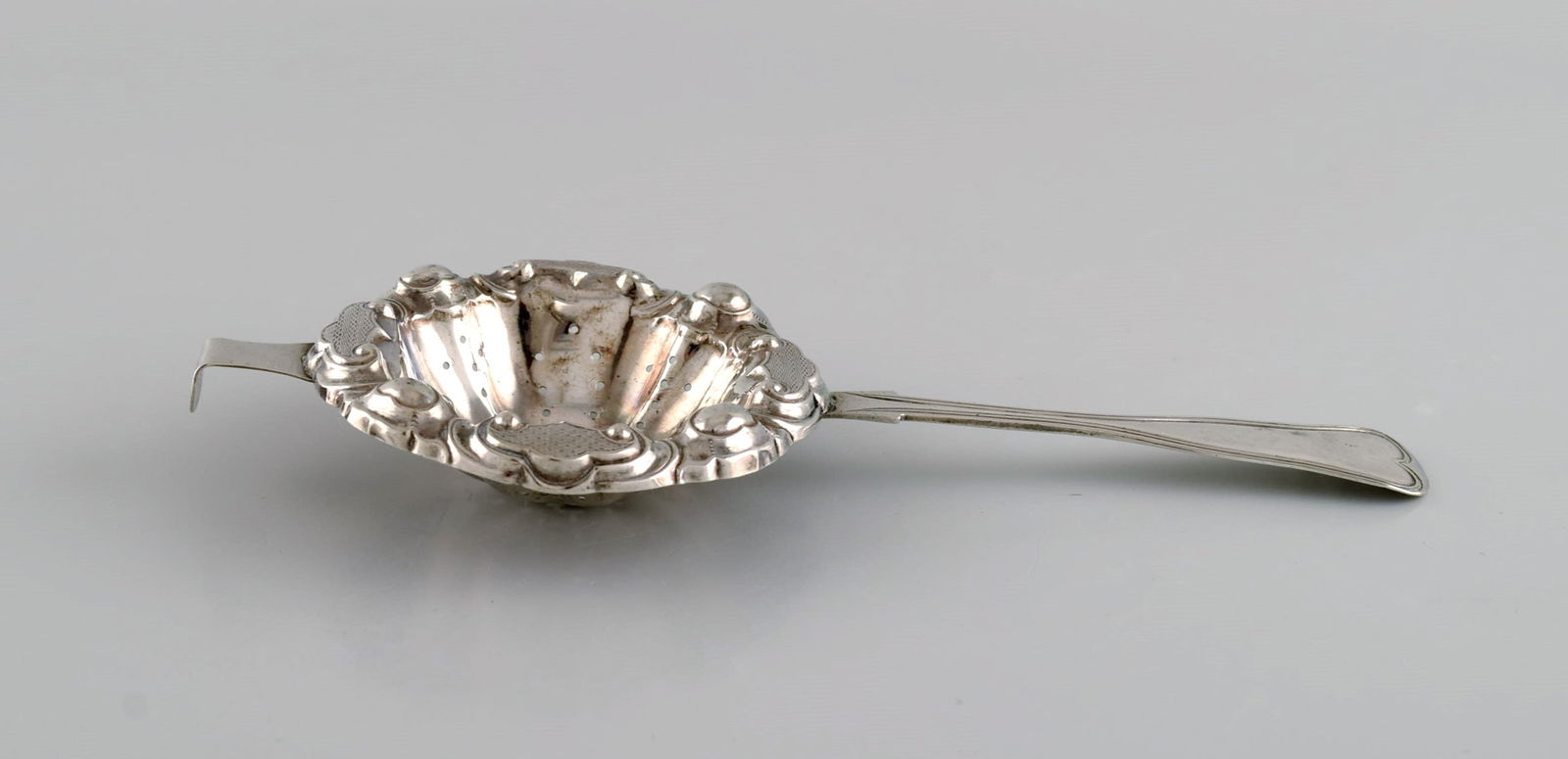 European silversmith. Antique silver tea strainer. Dated 1855 - 4