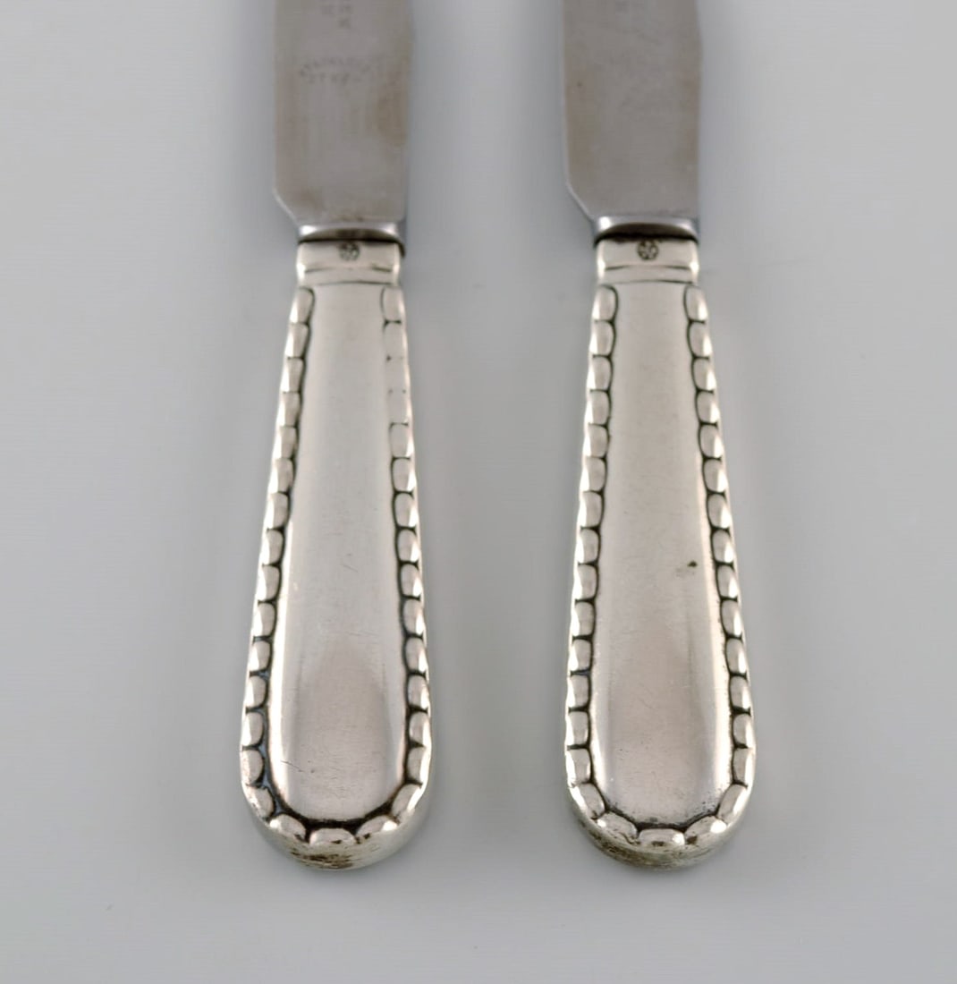Two early Georg Jensen Rope fruit knives in silver (830) and stainless steel. Dated 1915-1930. - 2