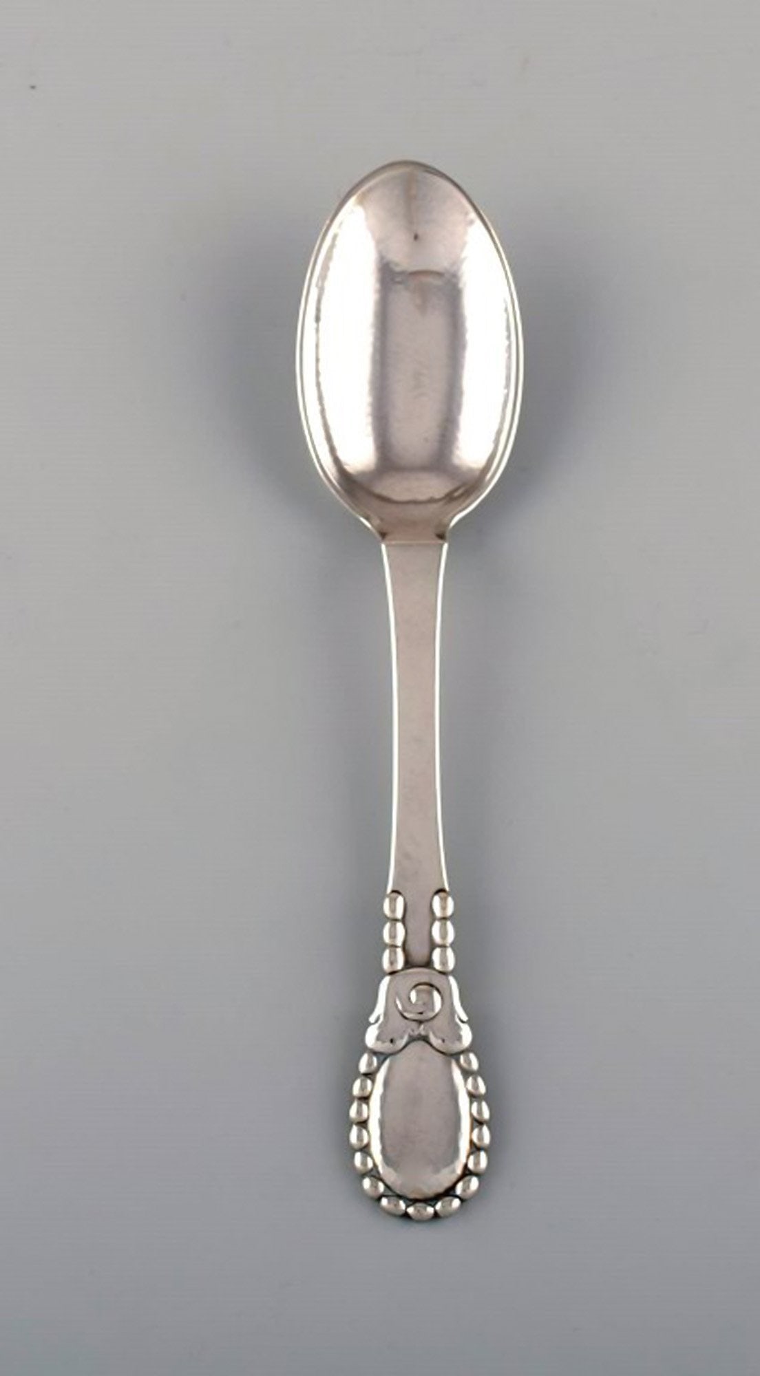 Evald Nielsen number 13 large tablespoon in hammered silver (830). Dated 1924. (1 of 4)