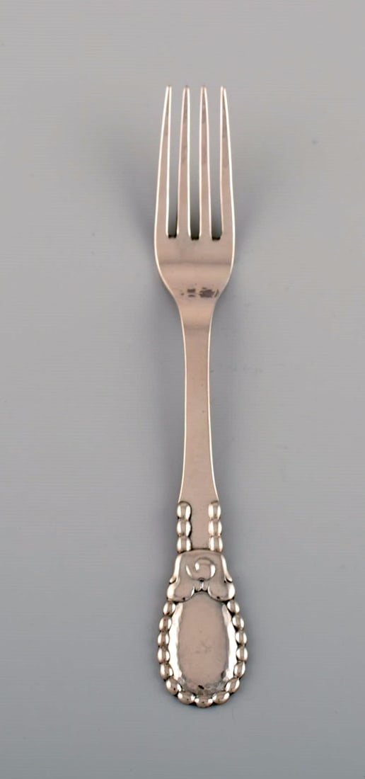 Evald Nielsen number 13 dinner fork in hammered silver (830). 1920's. 4 pieces in stock.: Title:Evald Nielsen number 13 dinner fork in hammered silver (830). 1920's. 4 pieces in stock. Description:Evald Nielsen number 13 dinner fork in hammered silver (830). 1920's. 4 pieces in stock. Leng