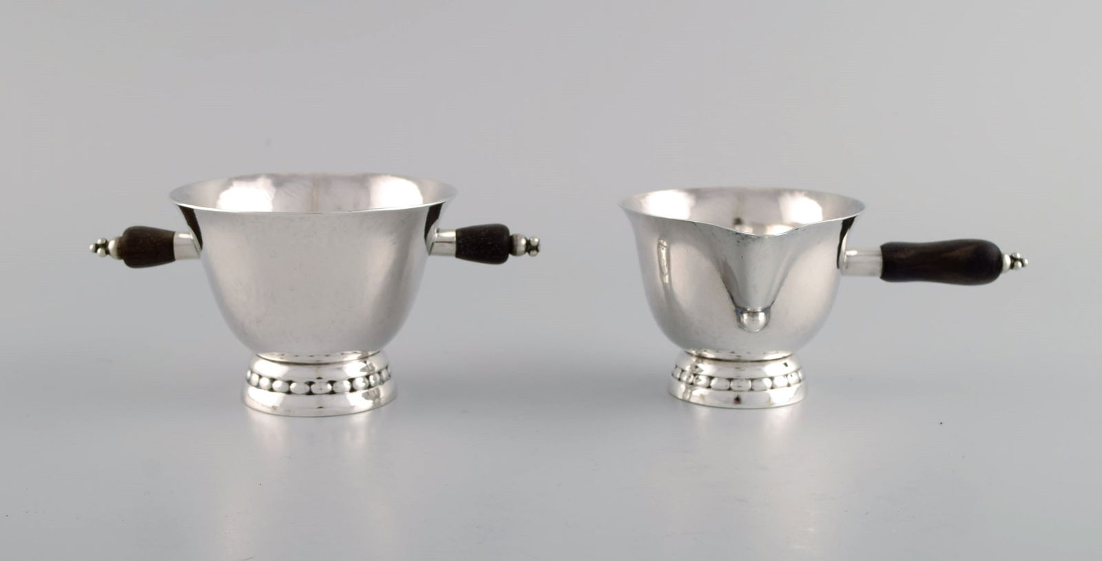Early Georg Jensen sugar / cream set in sterling silver with handles in ebony. Dated 1915-1930. - 2