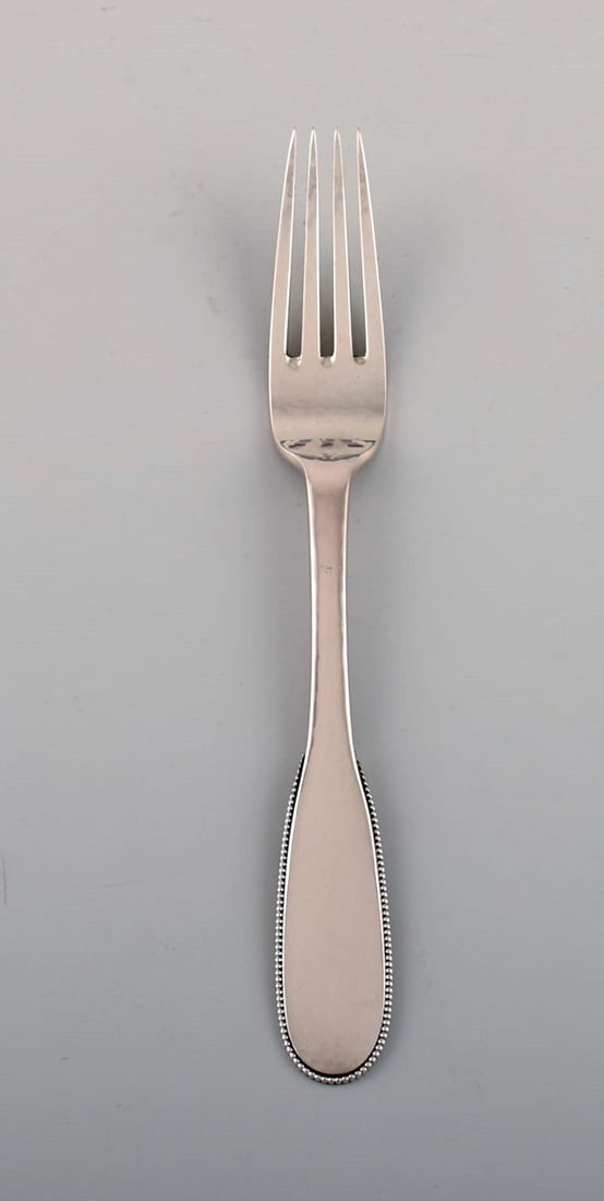 Evald Nielsen number 14 lunch fork in hammered silver (830). 1920s. 13 pcs in stock.: Title:Evald Nielsen number 14 lunch fork in hammered silver (830). 1920s. 13 pcs in stock. Description:Evald Nielsen number 14 lunch fork in hammered silver (830). 1920s. 13 pcs in stock. Length: 17.7