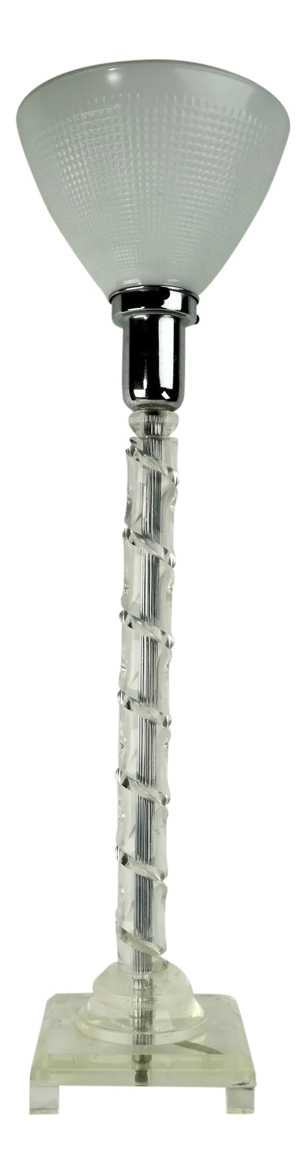 1950s Art Deco Lucite Twist Column Table Lamp: Glamorous Hollywood Regency Art Deco Style table lamp having a wrapped lucite column vertical post on stepped lucite base. The lamp is in ver clean, original and working condition, it accepts a standa