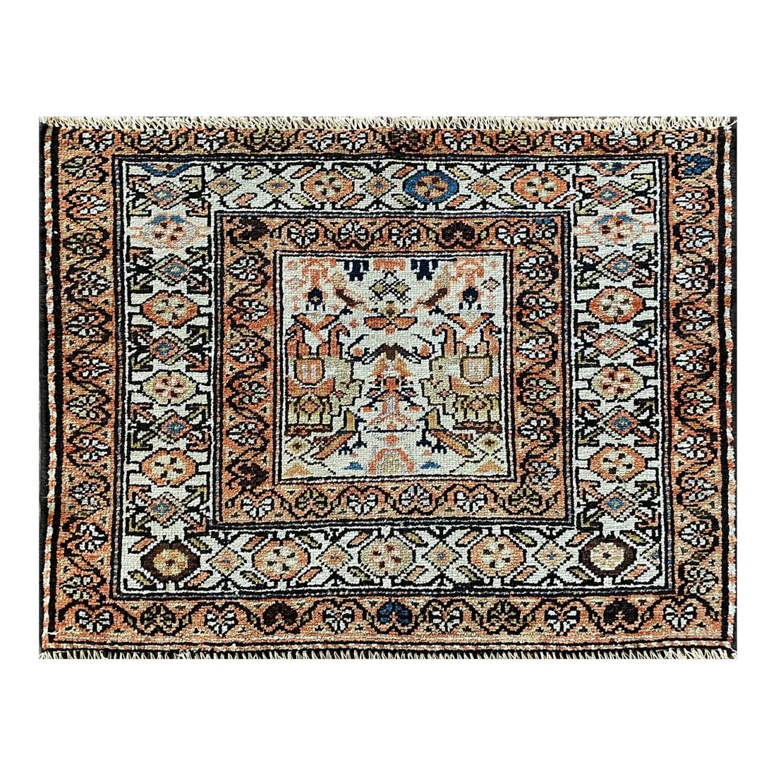 Antique Bakhtiari Rare Rug, the Prince and His Bird Guards: The color is balance, the ivory center in opposite of the darker border and design. The same way the design is balance, a scene of the prince with his gards the large birds in the center and a