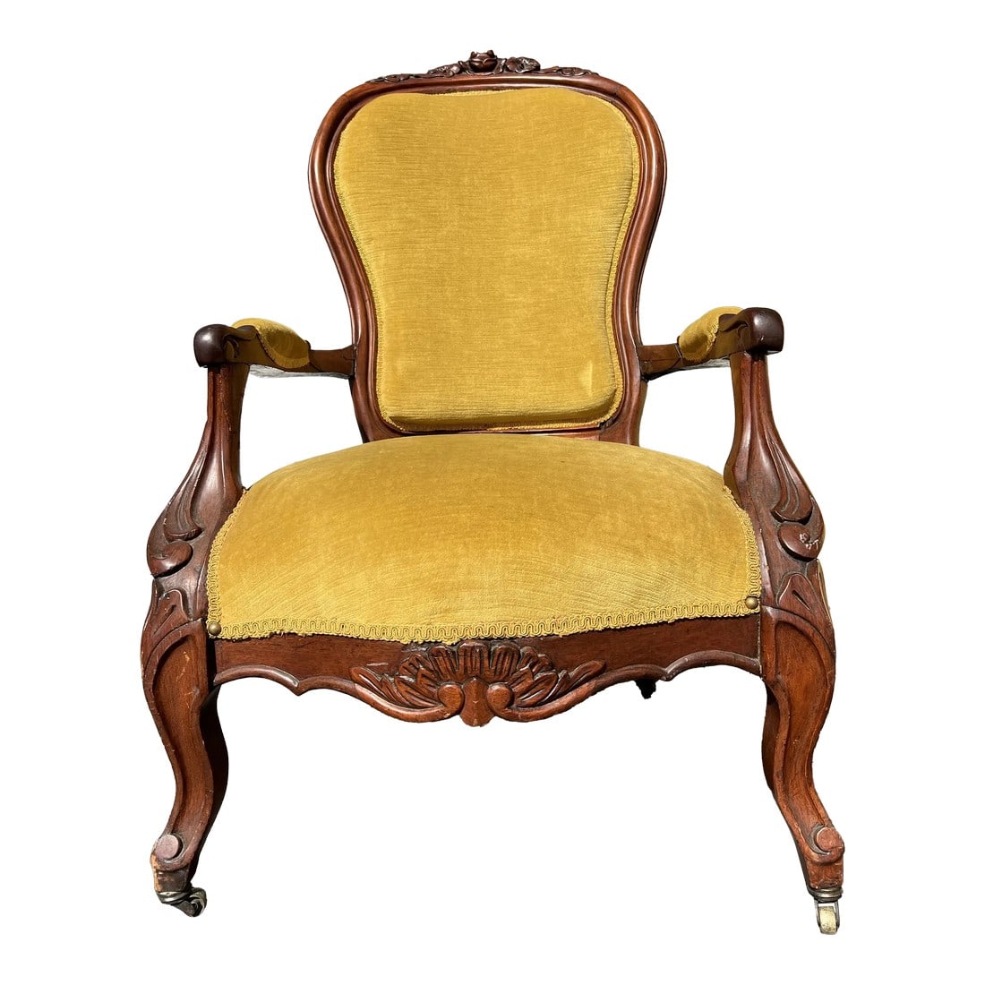 1940s Vintage Victorian Hand Carved Gold Velvet Chair: Hand carved walnut wood Victorian chair. Brass wheels to easily move around a room. Gold velvet upholstery. Condition: Alterations: Unknown Imperfections: Some Imperfections Condition Notes: Good cond