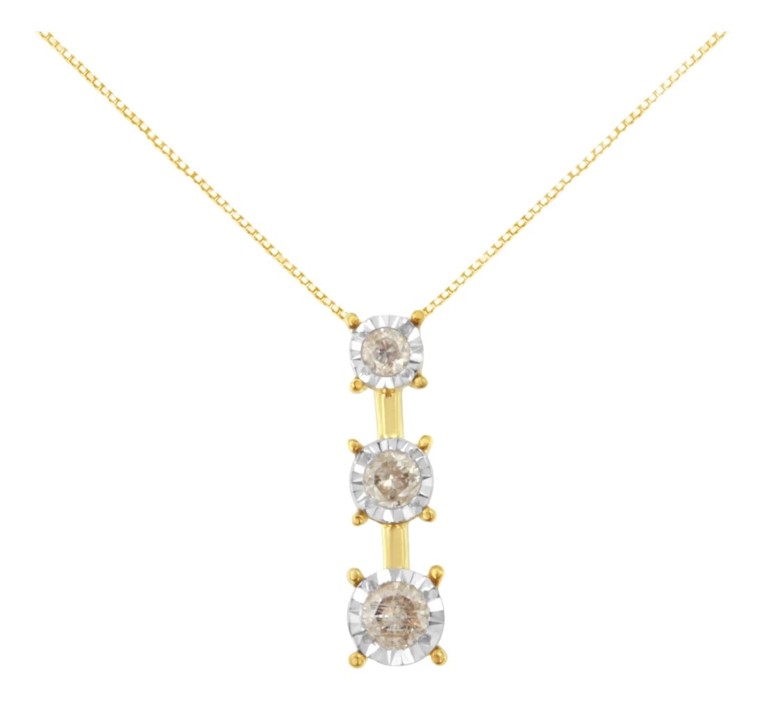 10K Yellow Gold 1/4 cttw Miracle-Set Brilliant Round Cut Diamond Graduating 3 Stone Drop 18" Pendant: Crafted in 10k yellow gold, this gorgeous pendant displays 1/4ct TDW of diamonds. 3 round cut diamonds graduating in size are miracle set over a warm yellow gold baton creating this elegant trilogy