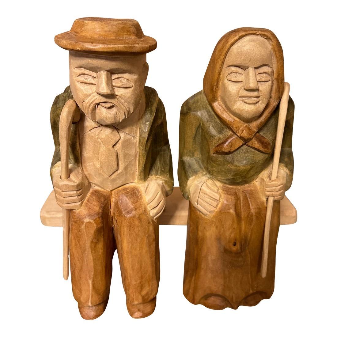 1970s Hand Carved Wooden Sitting Husband and Wife Sculpture: Up for consideration is a beautiful hand carved wooden sitting old couple sculpture. This would look lovely in your home and it is a great find for the interior design enthusiast. Please check out my