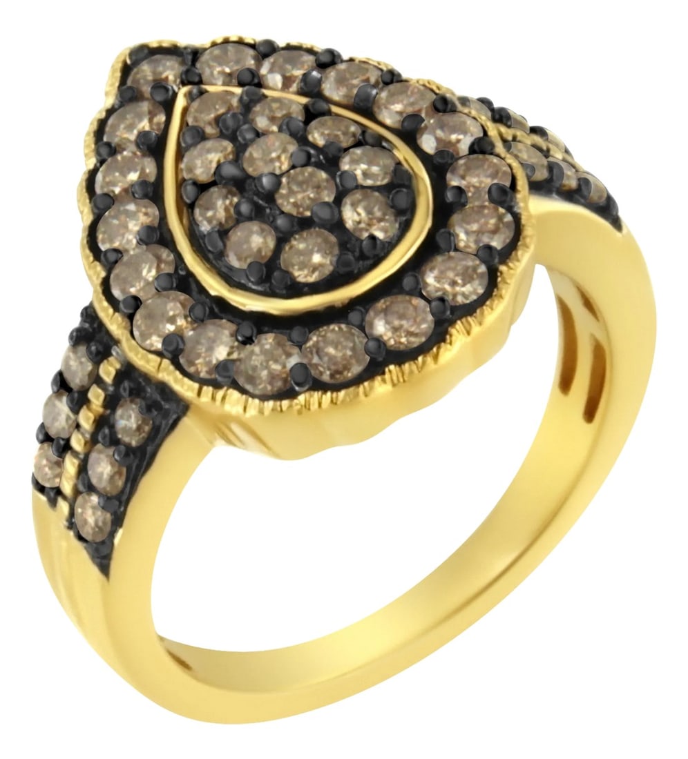 10K Yellow Gold Plated .925 Sterling Silver 1 1/8 cttw Prong-Set Round-Cut Diamond Pear Cocktail Rin: This unique design features 1 1/8ct TDW of diamonds. Sparkling round cut diamonds in a drop shaped cluster sit at the center of a diamond studded halo. A double row of round diamonds inlay the ring