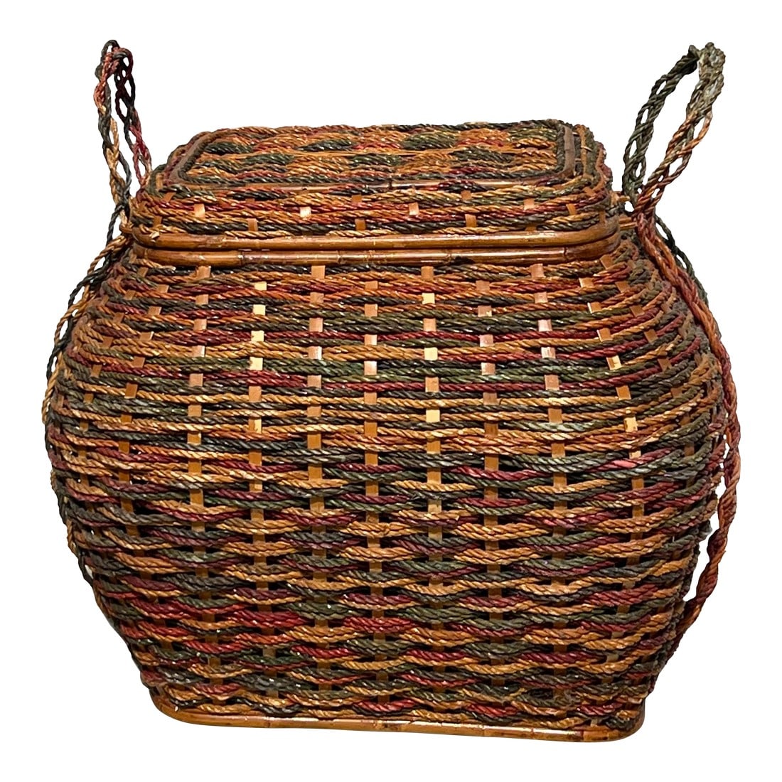 1970s Large Decorative Lidded Storage Basket With Colored Rope: Large decorative lidded storage basket made of woven colored rope. Bamboo reed strapping with interwoven rope and wood bottom. Bent bamboo framing and knot tied color rope on sides and handle. The