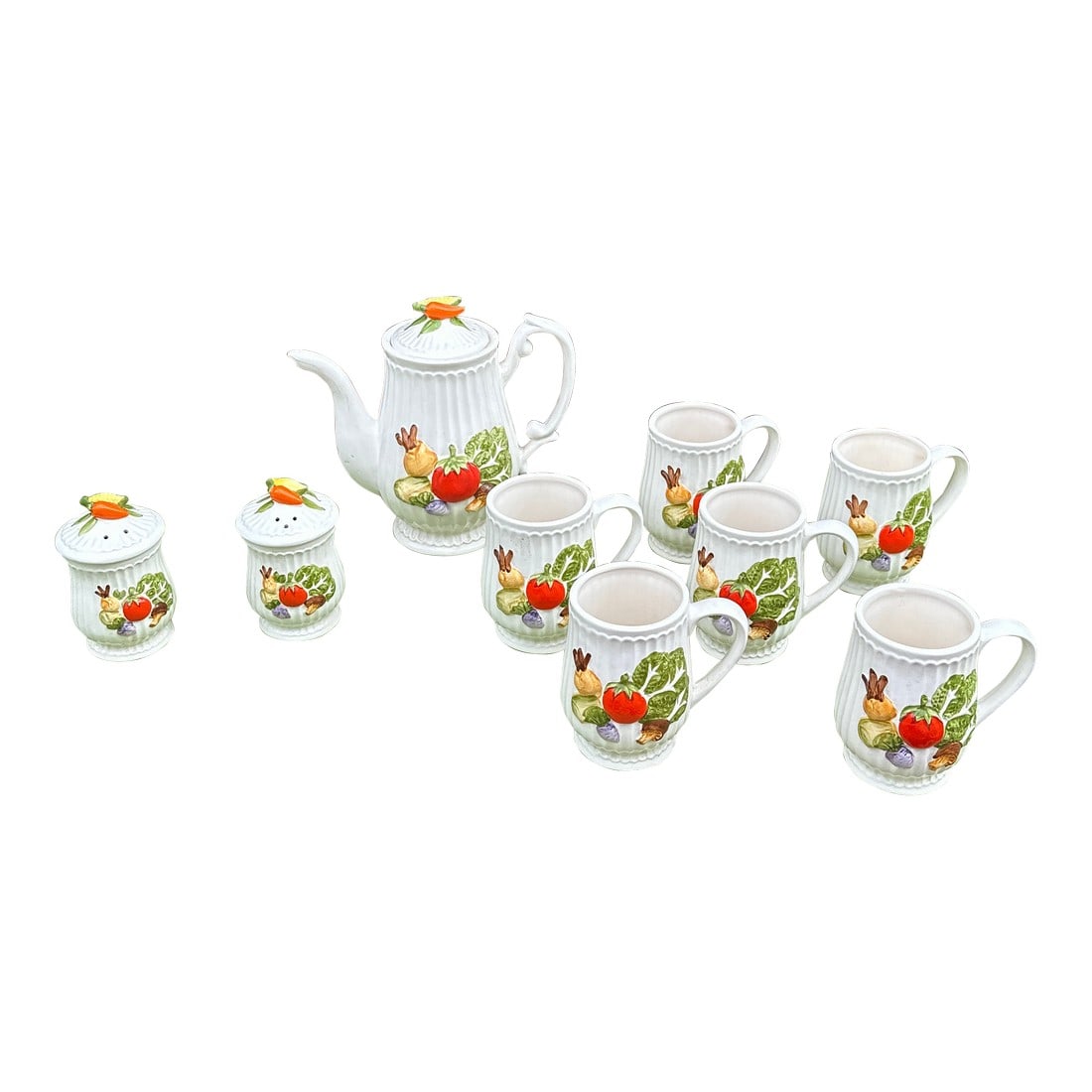 1970s Ceramic Vegetable Tea Set- 10 Pieces: Up for consideration is a beautiful ceramic vegetable tea set. This would look lovely in your home and it is a great find for the interior design enthusiast. Please check out my other listings! 