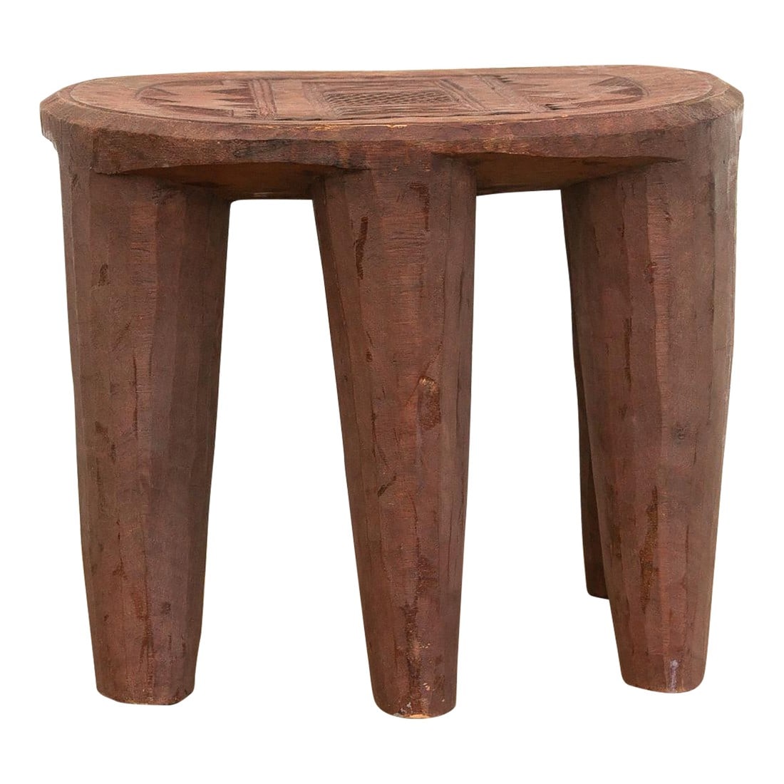 Handcarved Wooden Nupe Stool: A unique piece of African art, this vintage Nupe table from Nigeria is a must-have for collectors and enthusiasts of Nupe culture. Carved from a single log of wood and standing on 6 chunky tapered leg
