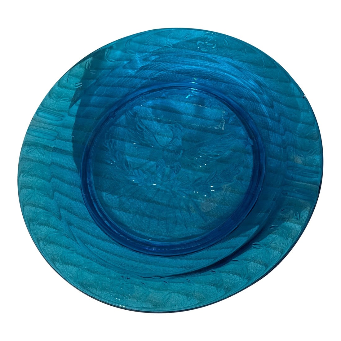 1970s Blue Glass Plate With Eagle Accents: Up for your consideration is this rare jewel tones Blue plate. Perfect to hang on your wall or display as is. This would look lovely in your home and it is a great find for the interior design