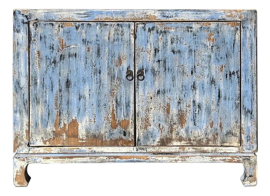 Distressed Blue 2 Doors Credenza Sideboard Console Table Cabinet: This is a low, rustic wooden cabinet with a distinctly weathered, antique appearance. The cabinet is finished in a faded blue-gray paint that has peeled and chipped extensively, revealing the natural