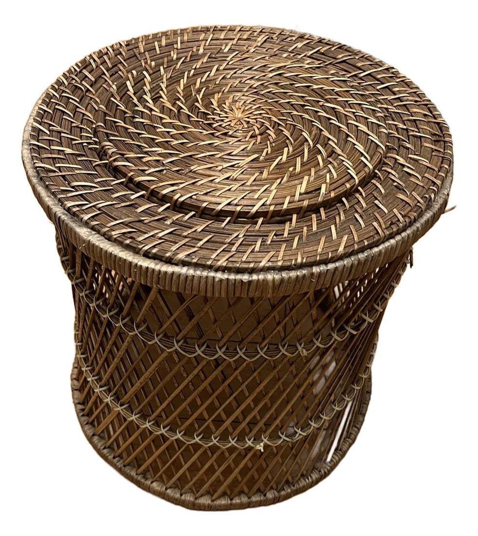 1970s Small Wicker Round Ottoman: Up for consideration is a beautiful round wicker ottoman. This would look lovely in your home and it is a great find for the interior design enthusiast. Please check out my other listings! 