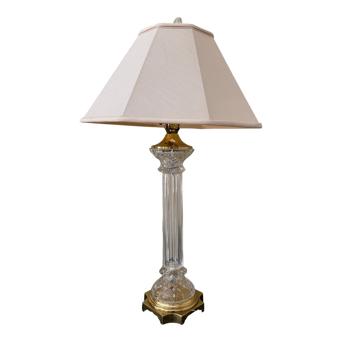 Mid Century Column Crystal Glass Lamp With Brass Base and Creamy White Lamp Shade: Elevate your space with this stunning Mid-Century Column Crystal Glass Lamp, a perfect blend of timeless elegance and modern sophistication. The sleek, transparent crystal glass column exudes a