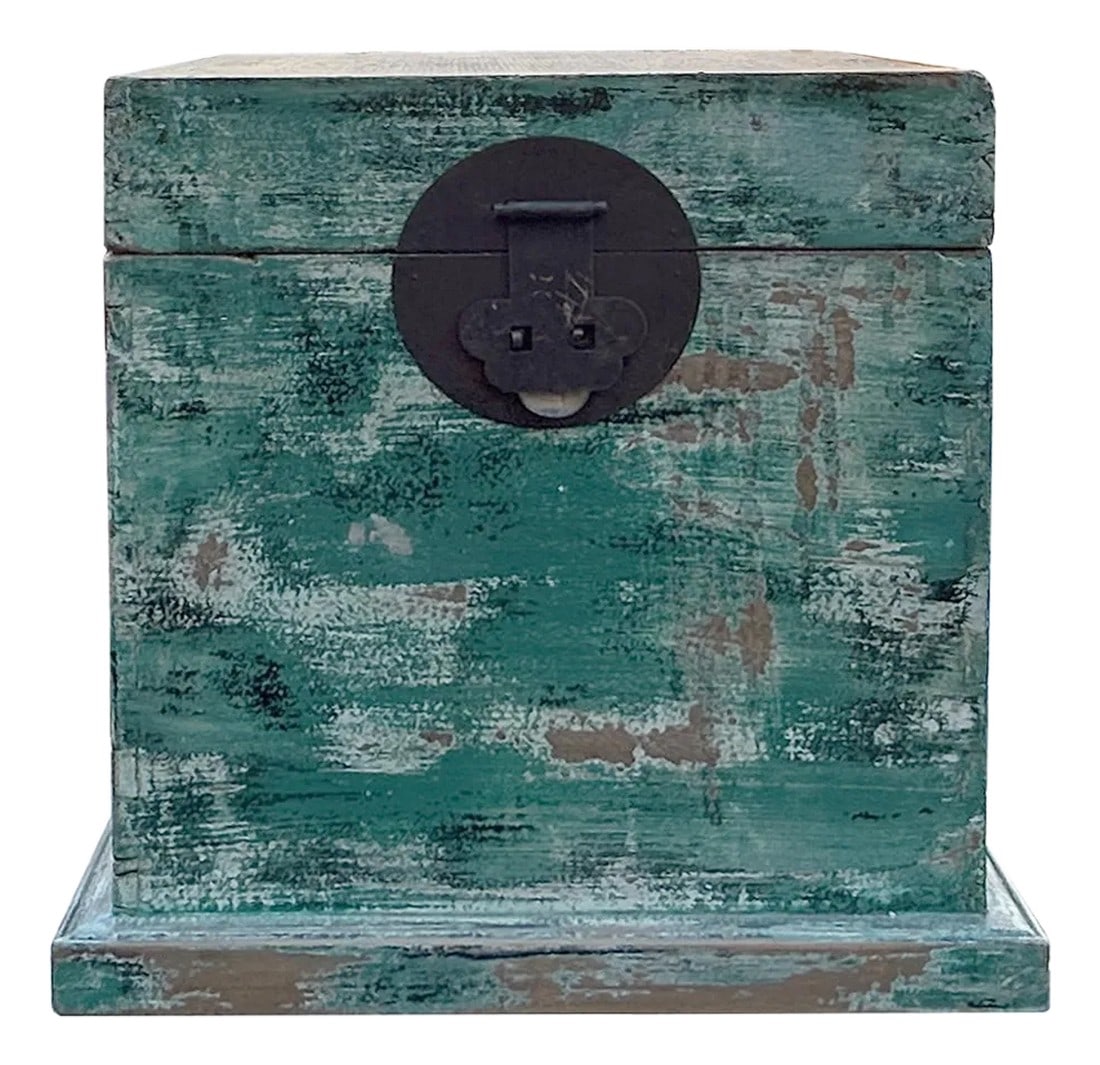Distressed Teal Green Square Moon Face Wood Trunk Box: This rustic wooden chest exudes a weathered, vintage charm with its distressed, teal green white finish that reveals layers of paint and the natural wood grain beneath. The chest features a sturdy,