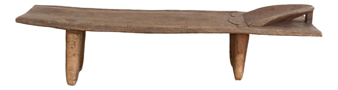 Timeless African Craftsmanship, Senufo Bed: A stunning piece of African history,this large antique Senufo bed from CÃ´te d'Ivoire is a rare and exceptional find. Hand-carved from a single block of hardwood, this authentic African bed