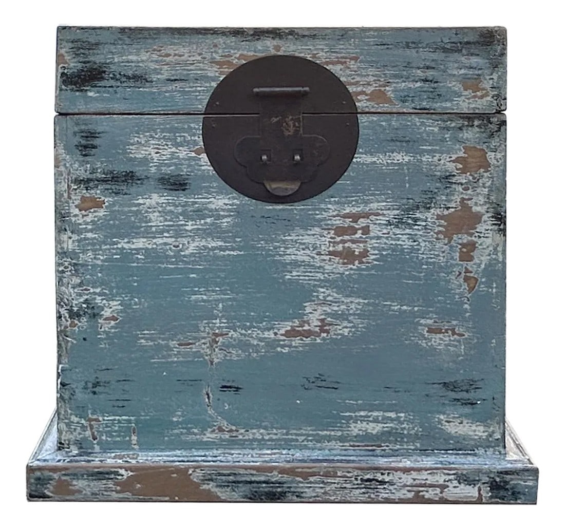 Distressed Pastel Light Blue Square Moon Face Wood Trunk Box: This rustic wooden chest exudes a weathered, vintage charm with its distressed, light blue white finish that reveals layers of paint and the natural wood grain beneath. The chest features a sturdy, re