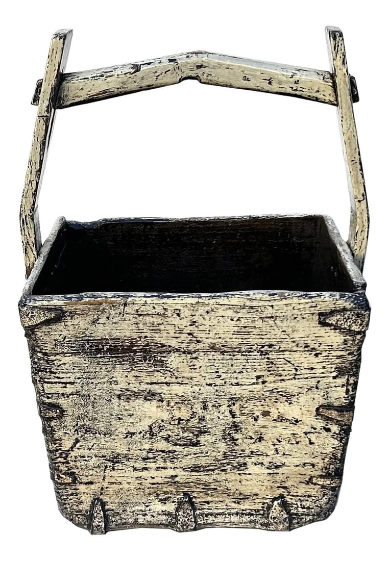 Vintage Rustic Gray White Square With Handle Wood Bucket: This rustic wooden bucket exudes a timeless, weathered charm, showcasing the beauty of aged craftsmanship. Constructed from sturdy planks of wood, the bucket features a distressed marks Gray Off